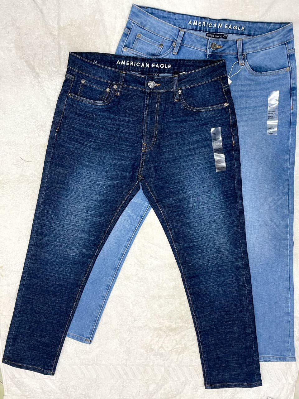 1f232855-3150-47bc-b57b-fc8159d6c1e8 American Eagle original export Deep Blue & Light wash Combo - Image 1